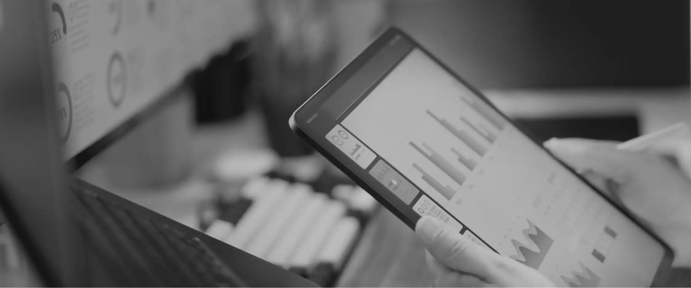 An interactive analytics dashboard on a handheld tablet